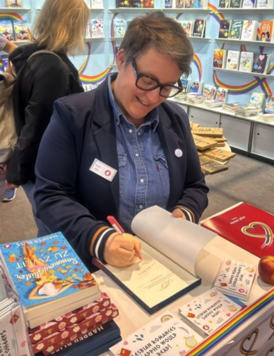 Harper Signs A Book