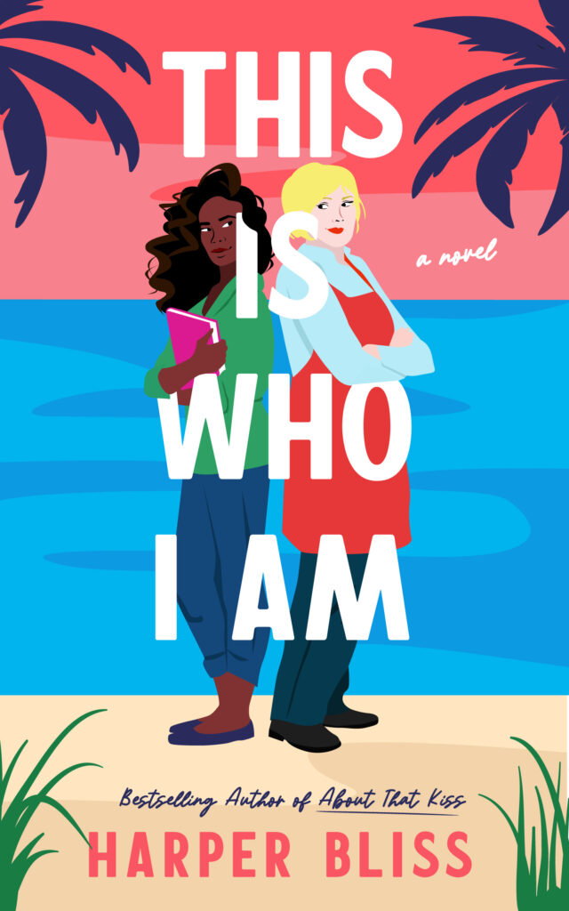 Illustrated book cover for "This Is Who I Am" by Harper Bliss. Two women stand back-to-back in front of a sunset ocean backdrop with palm trees. One woman has dark curly hair, wears a green top, and holds a pink notebook. The other has short blond hair and wears a red apron over a light blue shirt. Bold white text overlays them with the title. The tagline reads “A novel,” and the author is billed as the Bestselling Author of About That Kiss.